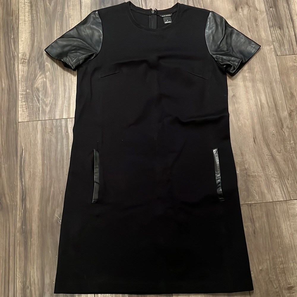 Club Monaco Black dress with leather sleeves and trim at pockets